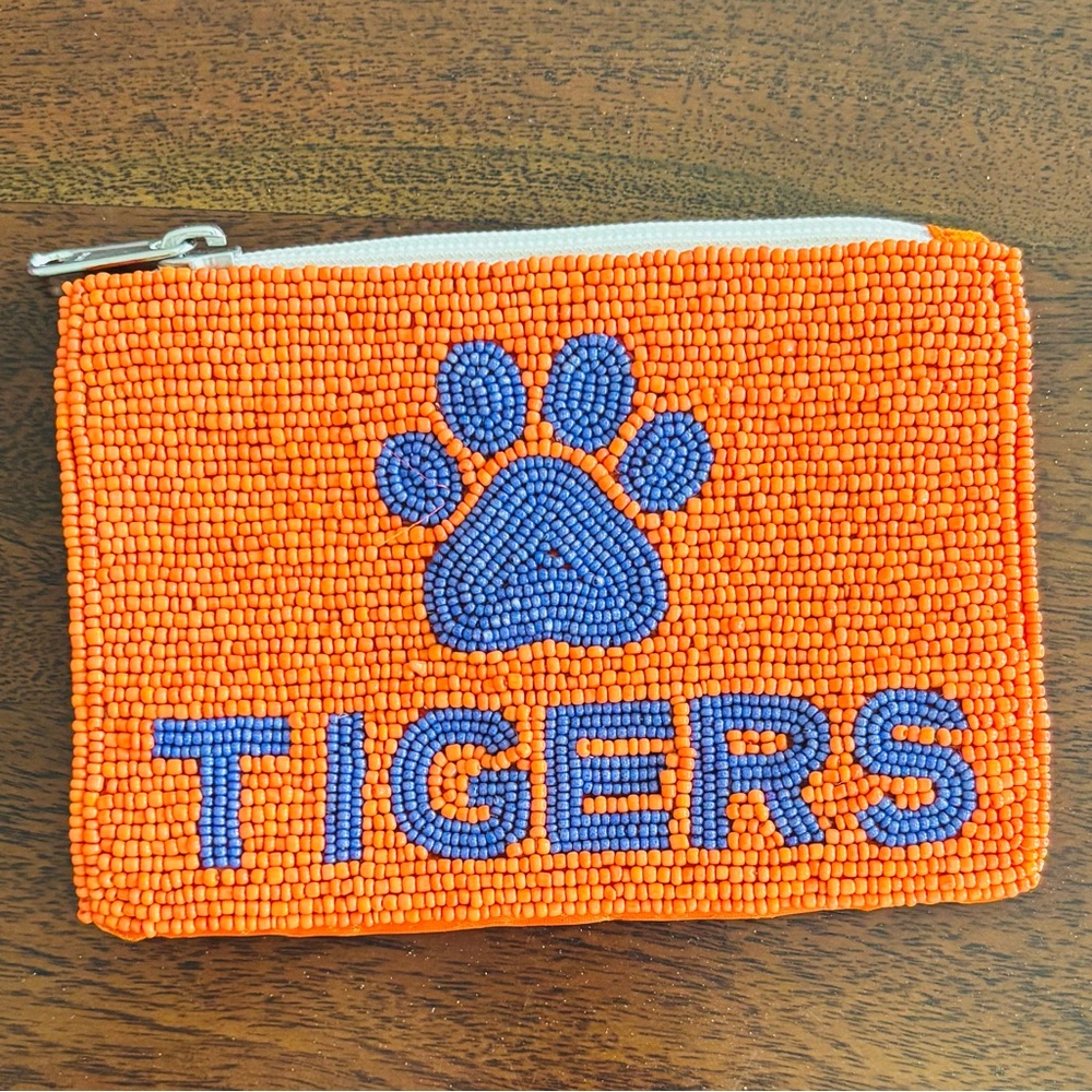 Orange Beaded Pouch with Purple Paw Design. Great for Clemson fans!